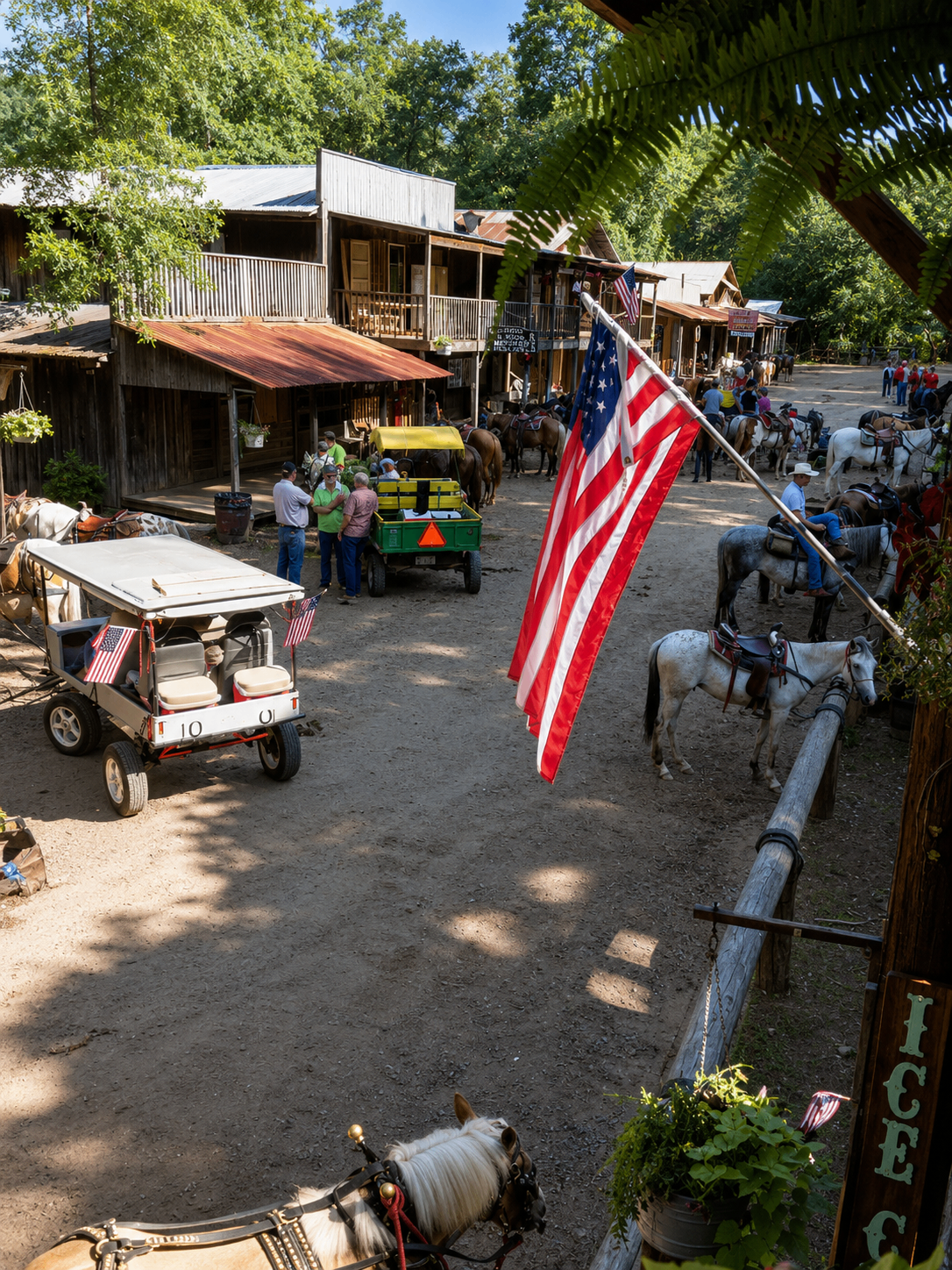 Main Street view with horses, riders, wagons and an American flag